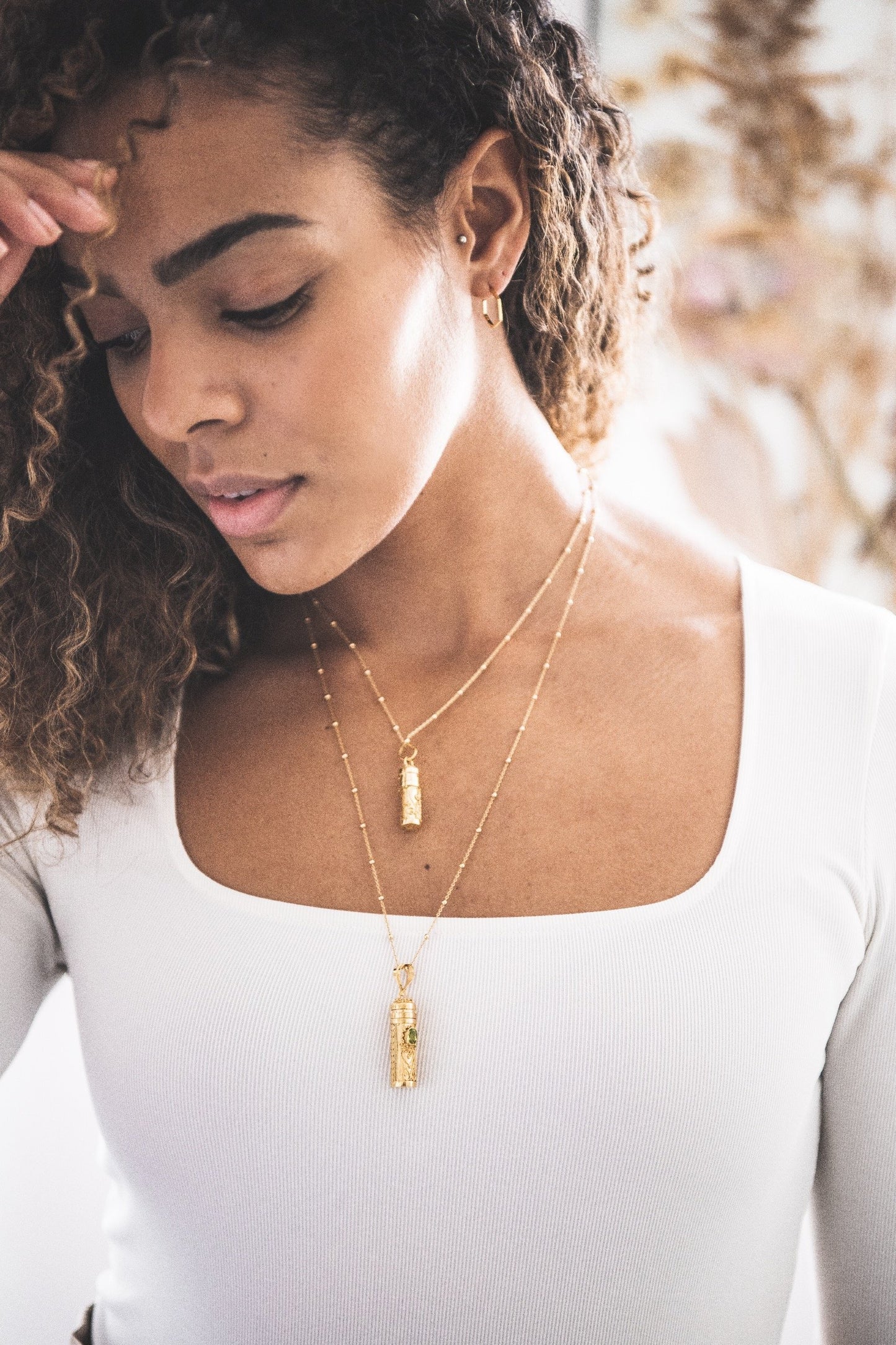 Woman wearing Garnet Wishing Locket