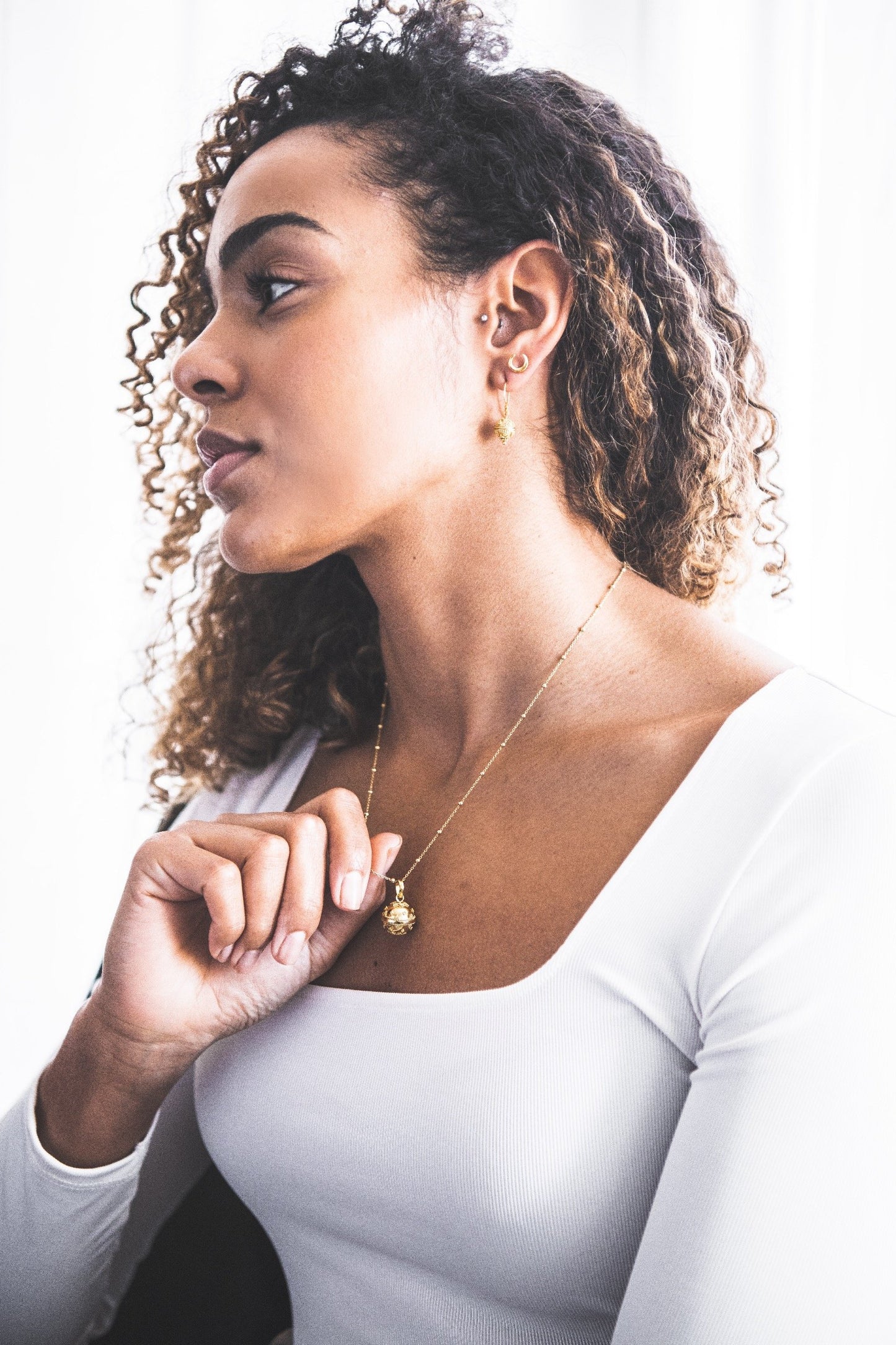 Woman wearing Crescent Stud