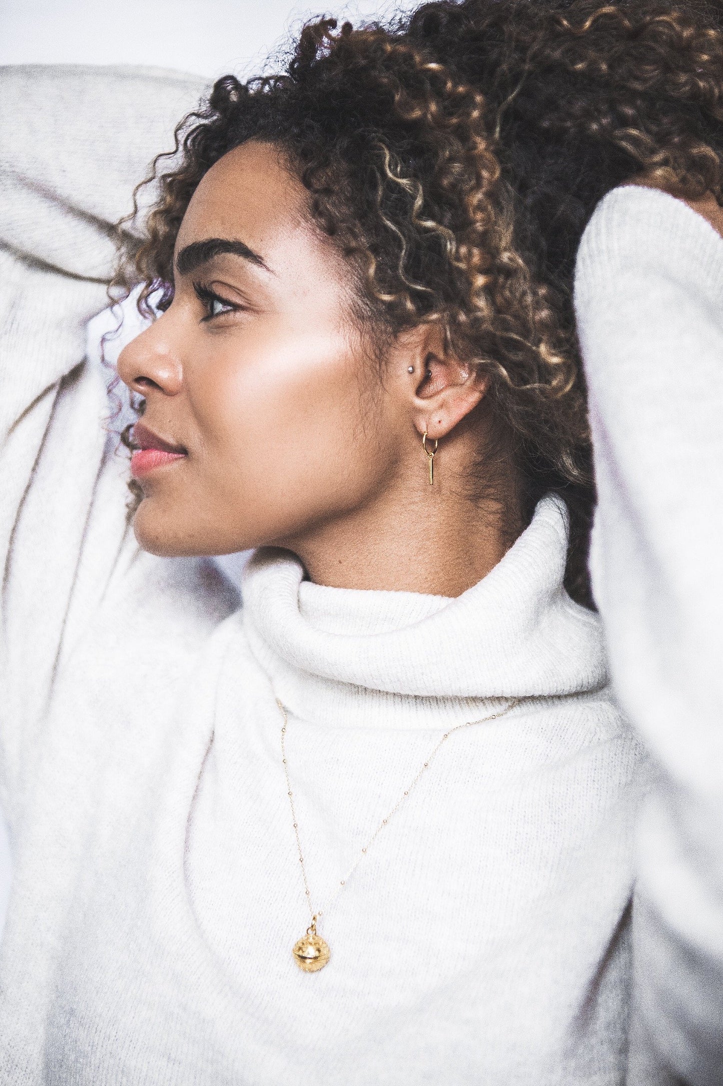 Woman wearing Small Bar Drop Hoop earring