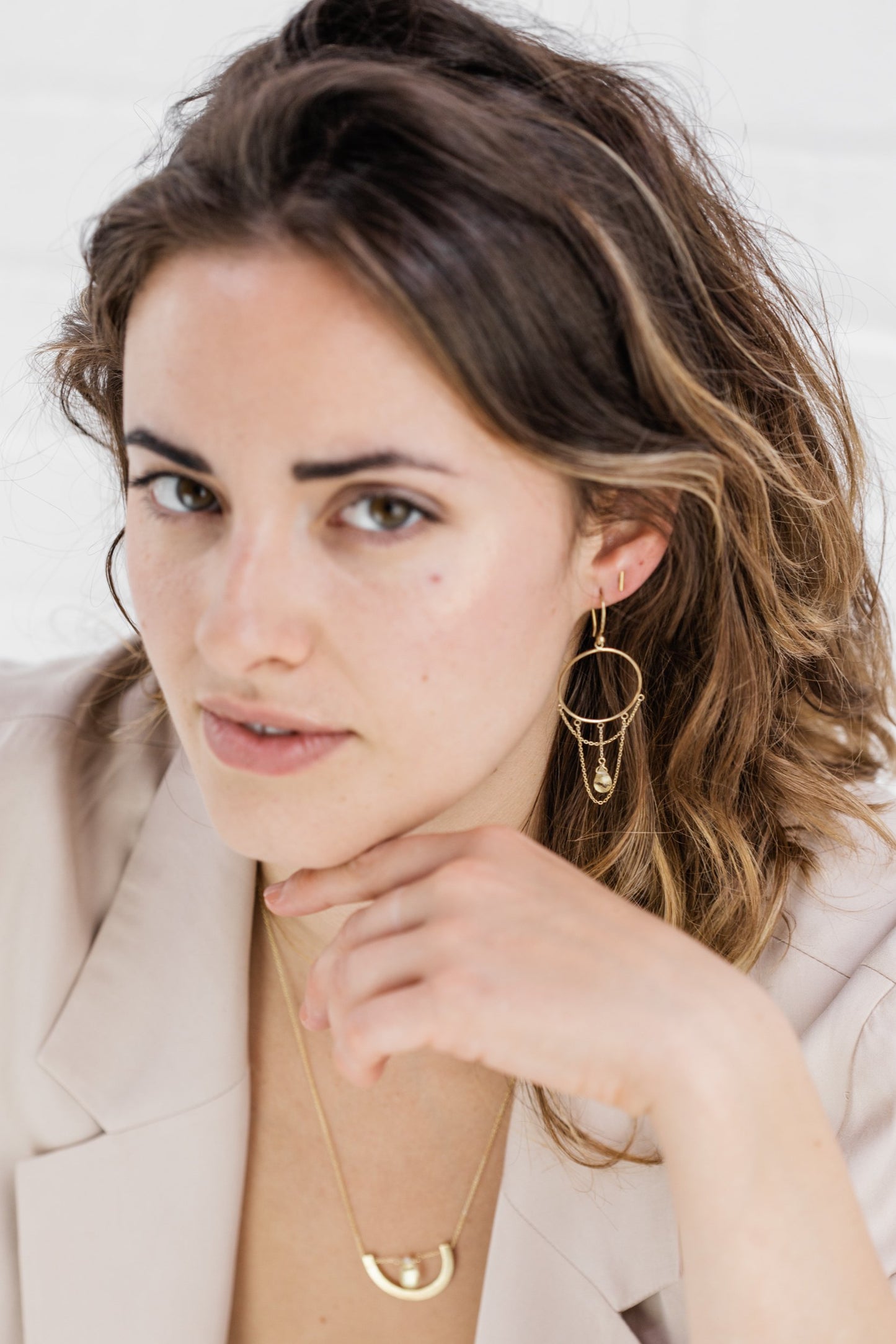Woman wearing Guardian Chandelier Clear Quartz Drop Earring