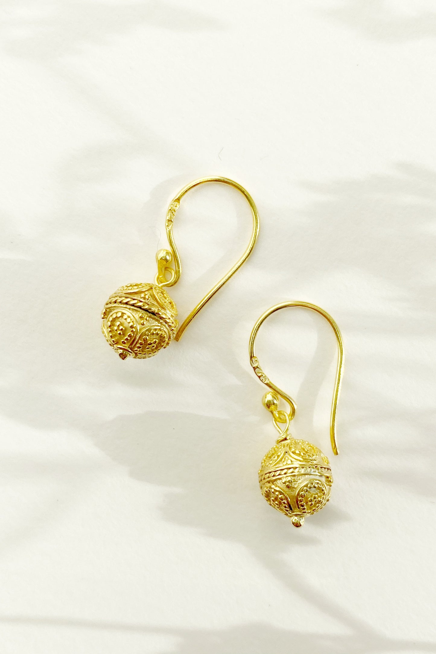 Close up of Mini Bali Harmony Ball Earrings