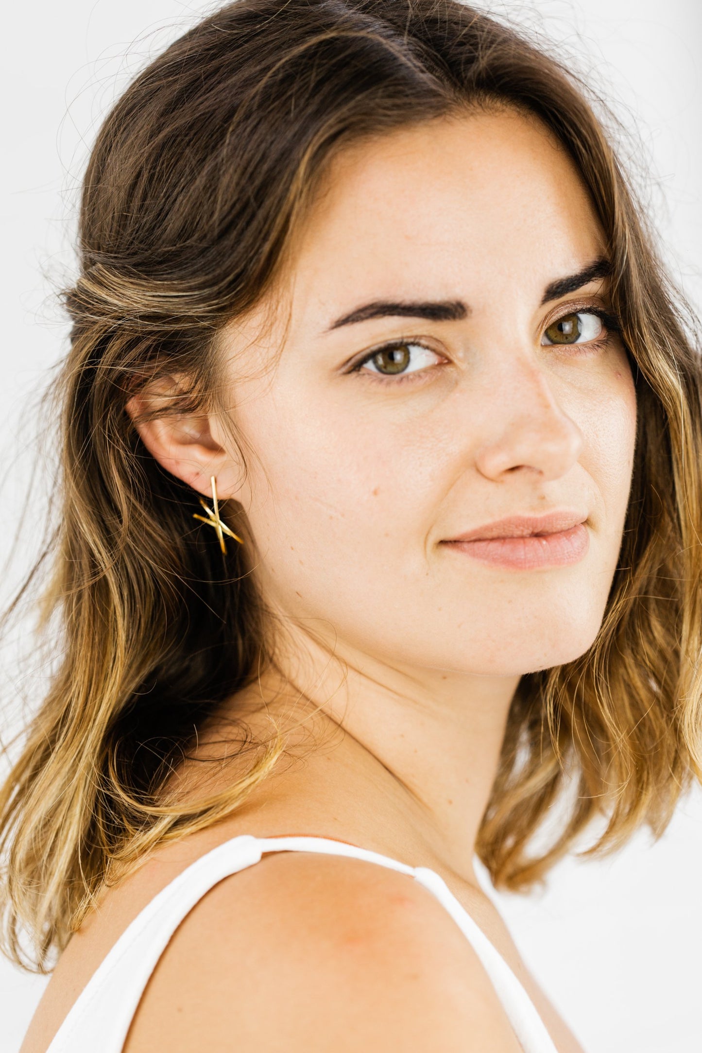 Woman wearing Valentina Galaxy Hooped Stud earring